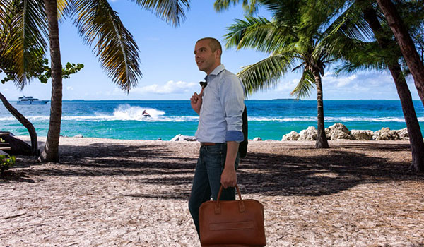 a working man on holiday in tropical location