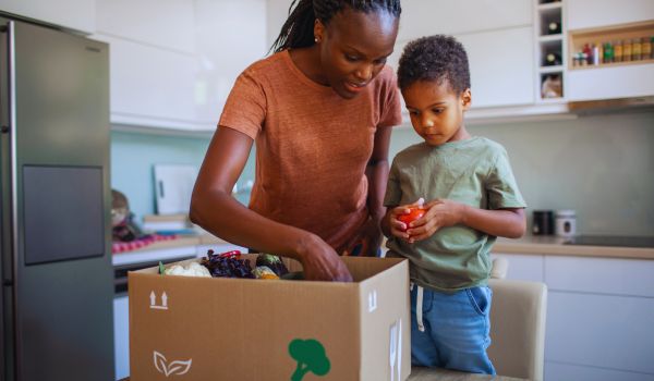 a family in the netherlands opening a meal delivery kit