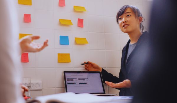 a female executive giving a presentation