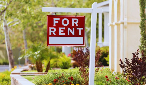 a for rent sign outside a property