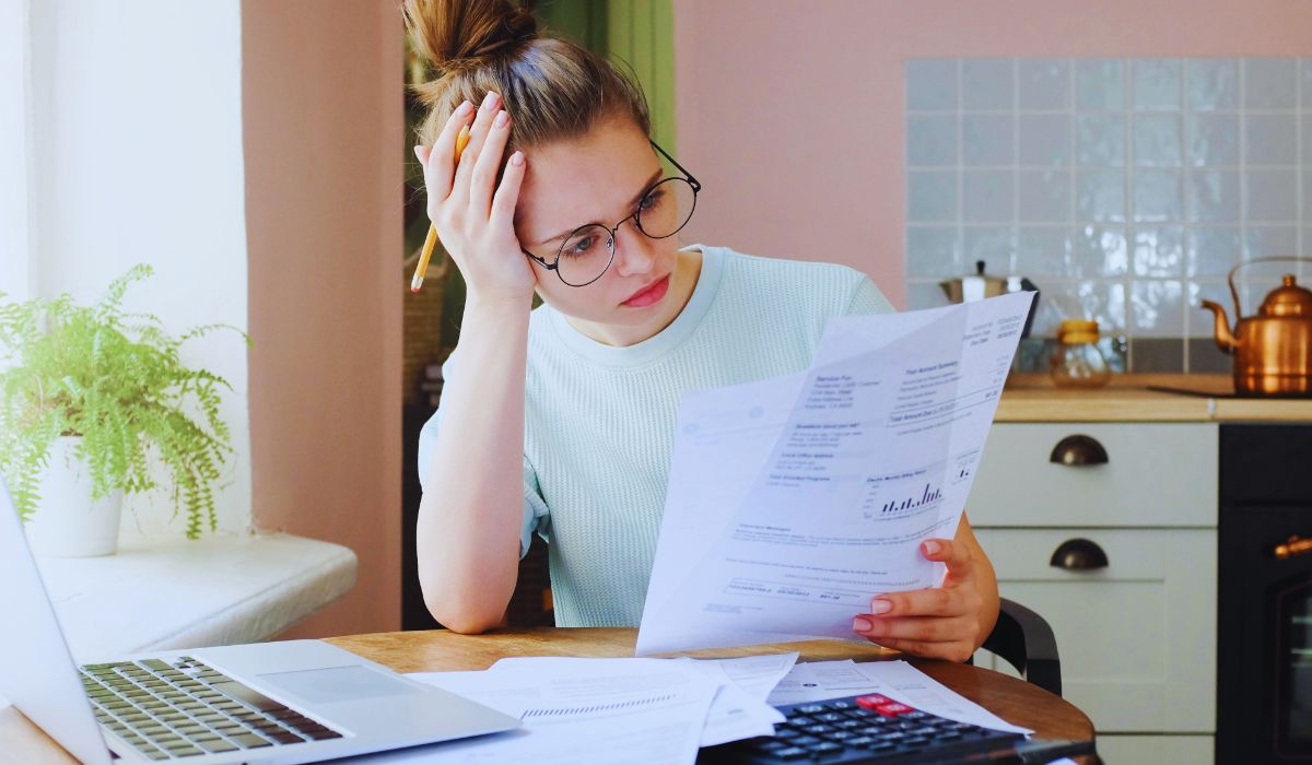 a woman checking her debt