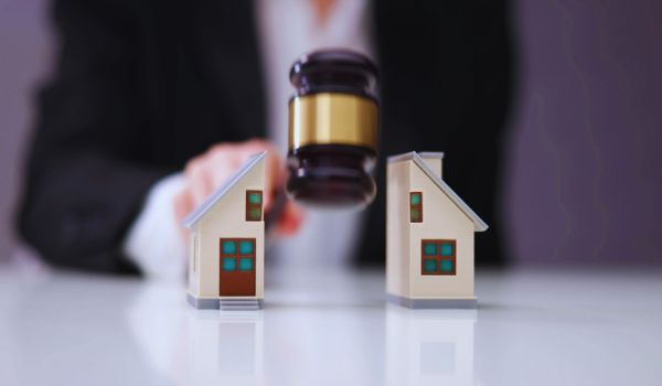 a divorce lawyer splitting property in two