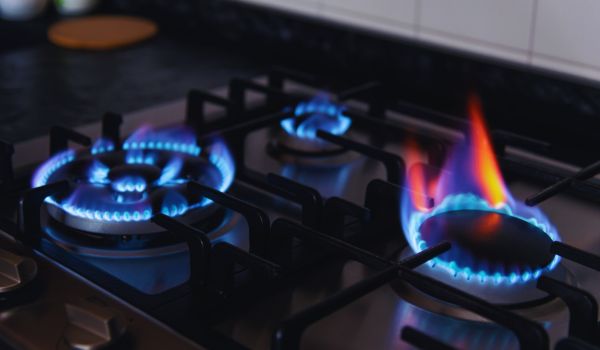 a set of burners on a gas oven